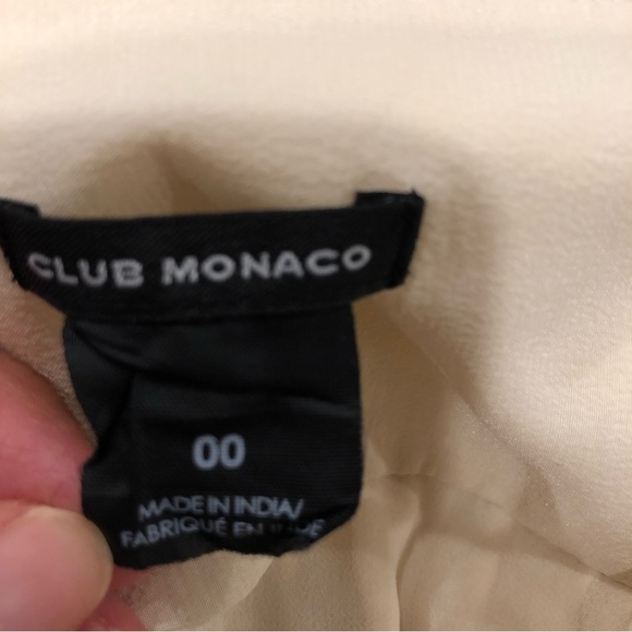 Club Monaco cream mini skirt with gray white beaded trim on bottom. Size 00. - Picture 2 of 6